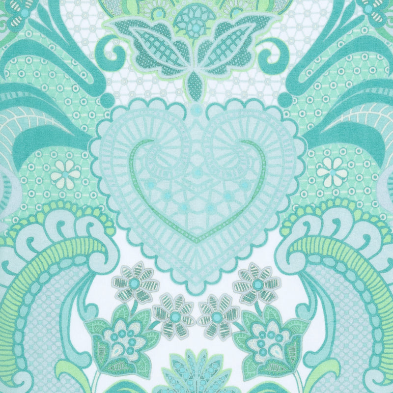close up of a silk georgette fabric in an emerald print