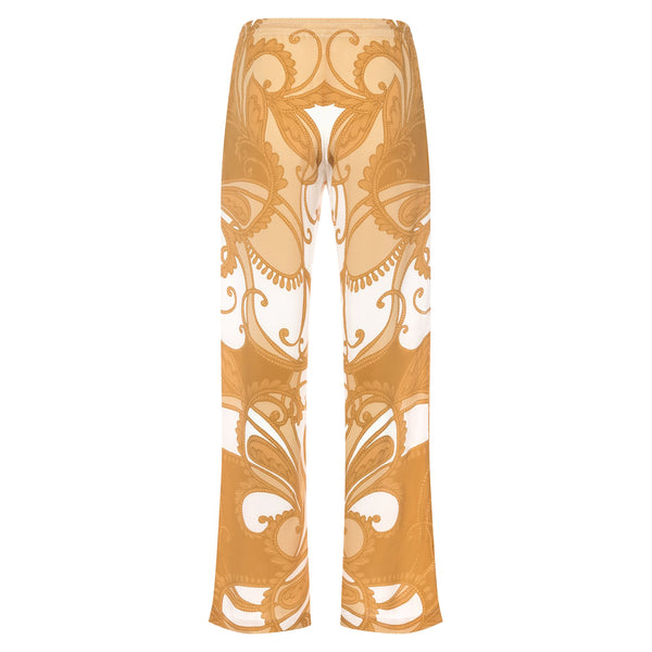 back of a women wide leg silk palazzo pants in a yellow paisley print