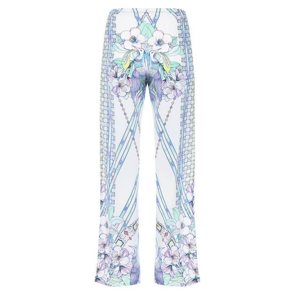 back of a women wide leg silk palazzo pants in a multicolor pastel print