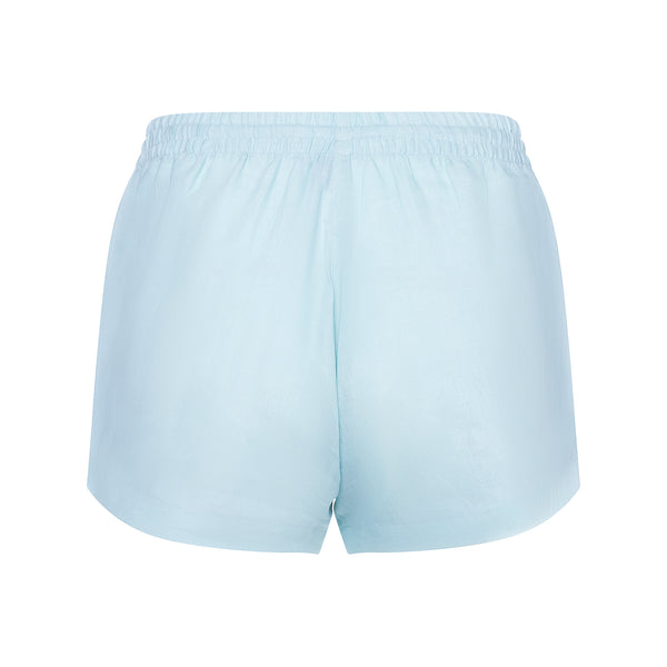back of a women linen shorts in pastel blue