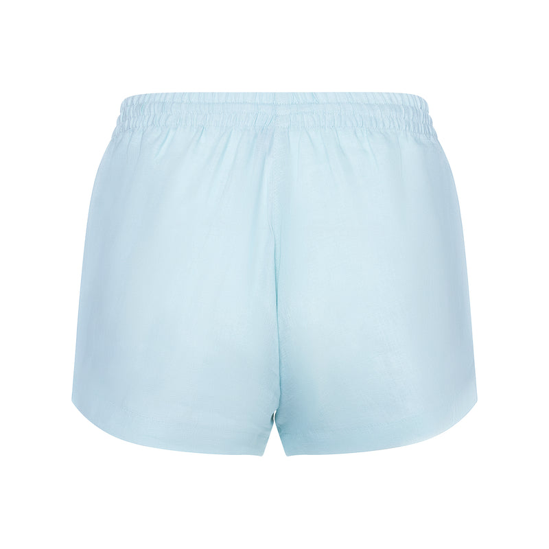 back of a women linen shorts in pastel blue