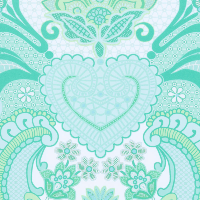 close up of a swimsuit fabric in an emerald print