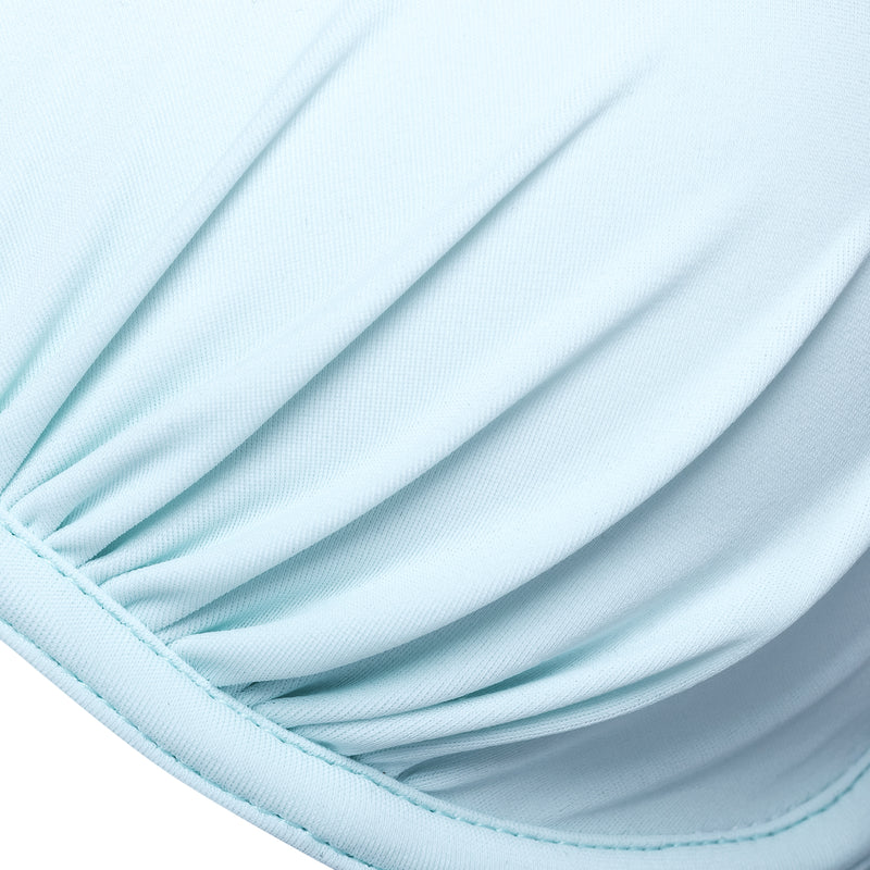 detail of a push-up bikini top in pastel blue